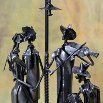 Tango couple and musician statuette